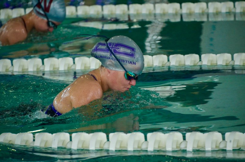 Royals senior Libby Dawson heads back down during the breaststroke.