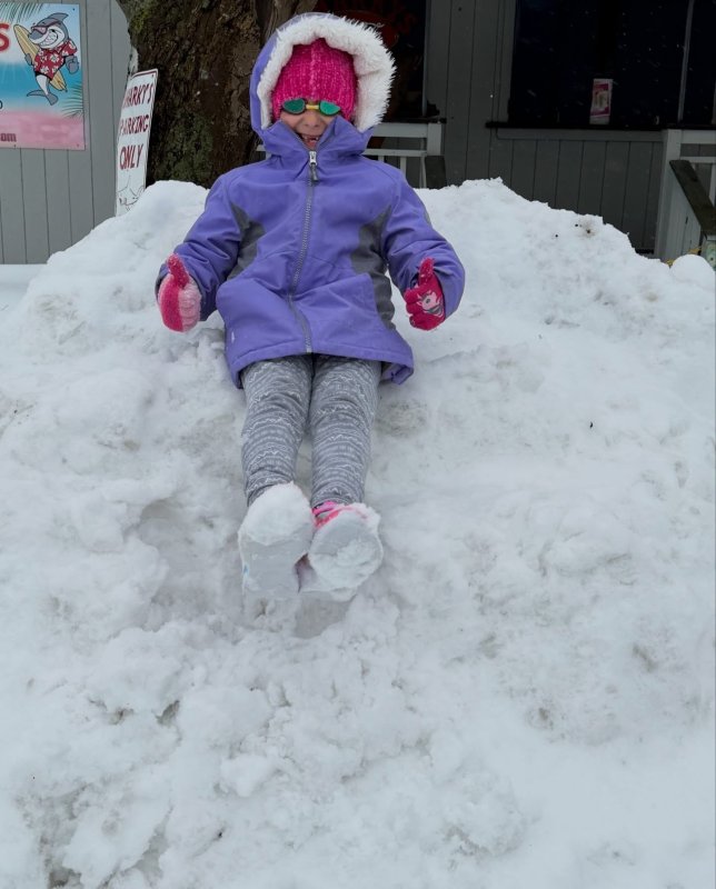 Morgan Moskowitz enjoyed sliding, making snow angels and building a snowman in Dewey Beach.