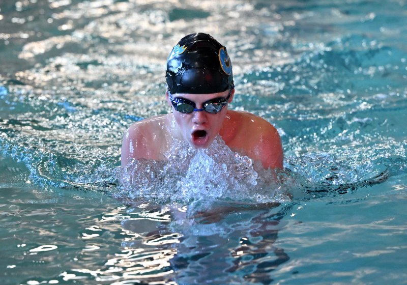 Noah Cieniewicz swims the IM for the Vikings.