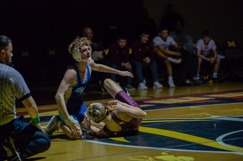 Cape’s Cale Baker wins by pin at 120. DAVE FREDERICK PHOTOS