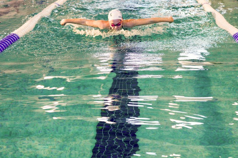 Sussex Academy senior Sarah Lester-Stranick competes in the butterfly.