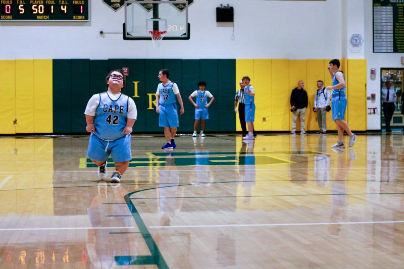 Cape sophomore Norman Rust leads the offensive formation on an in-bound play.