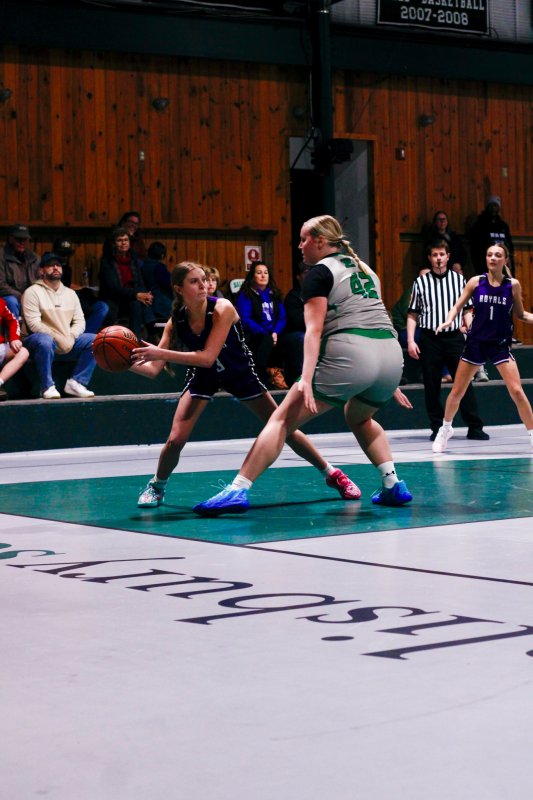 Delmarva Christian freshman Addison Price begins to pass the ball.