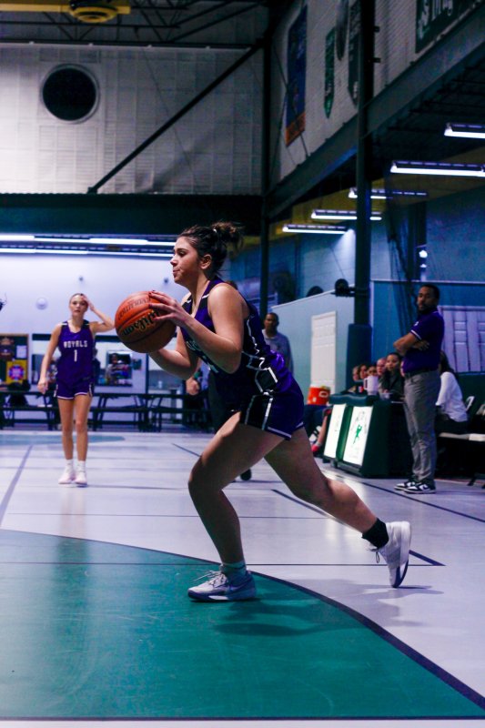 Delmarva Christian freshman Chloe Tremblay cuts into the arc.