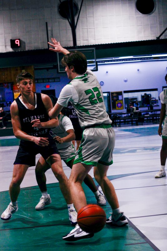 Delmarva Christian junior Landon Jackson passes the ball inside.