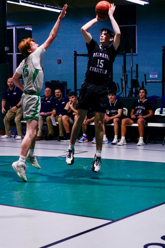 Delmarva Christian senior Gideon Woods puts up a fadeaway.