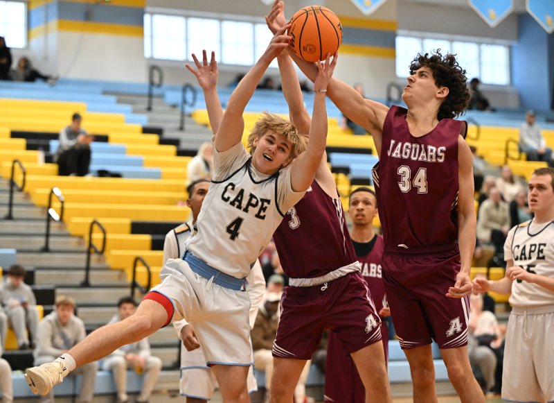 Cape unified partner Logan Felker battles for a rebound with Appo’s Dylan Bacon.