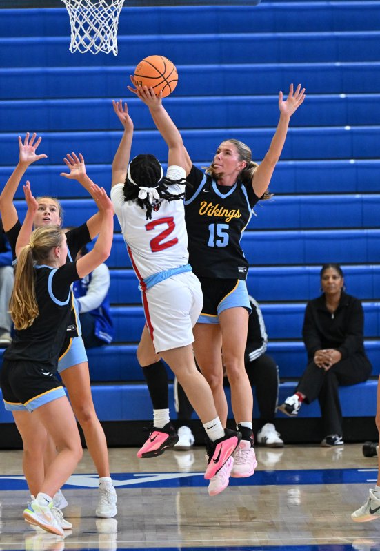 Cape senior Amalia Fruchtman blocks a shot by ECS’s Ashyra Brown.