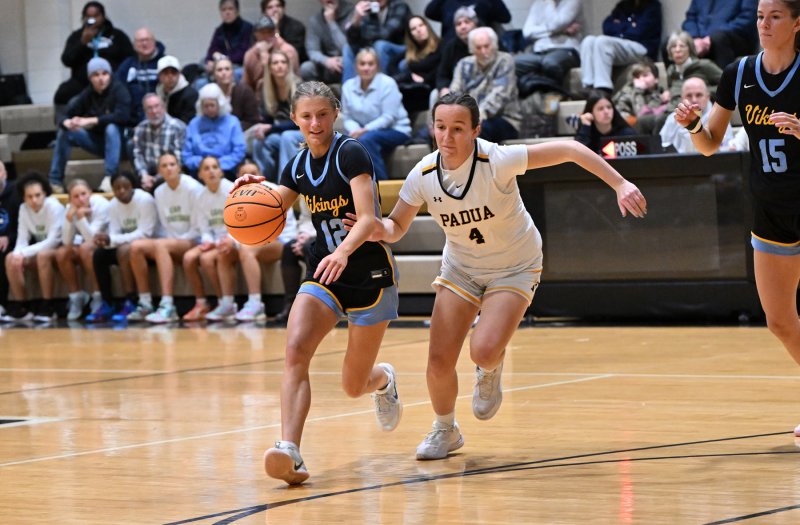 Cape junior Amara Fruchtman drives past Padua’s Riley Bransfield.
