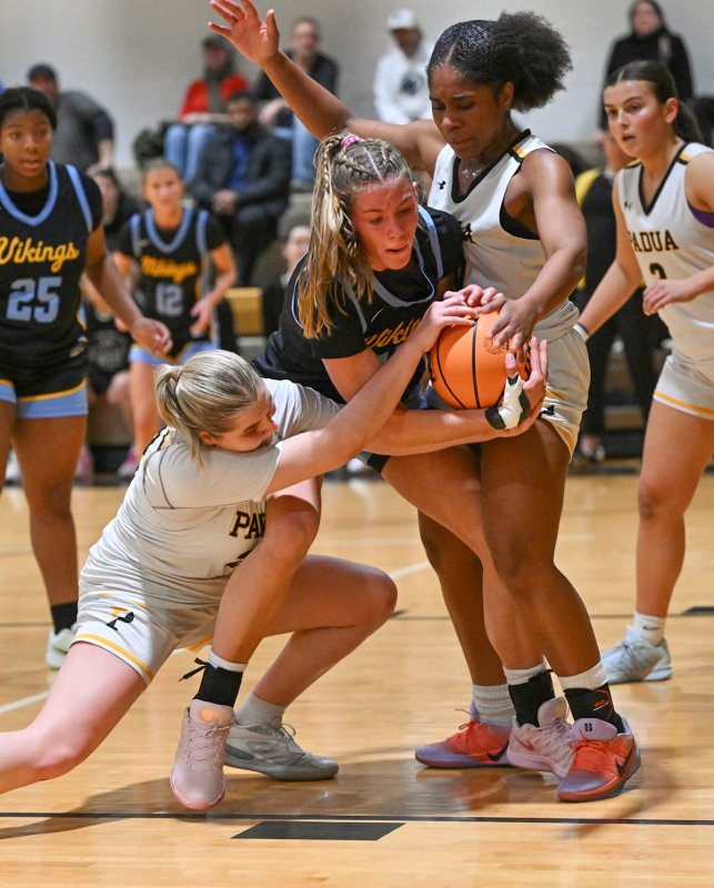 Cape’s Amalia Fruchtman out-muscles Padua’s Lilianna DiMarco, left, and Kai Dwirantwi.