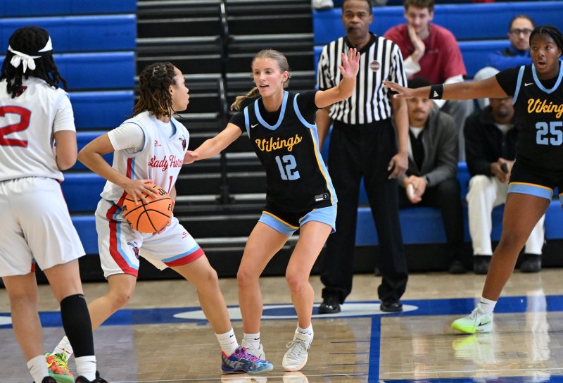 Junior Amara Fruchtman plays defense on the Hornets’ Marshay Brown.