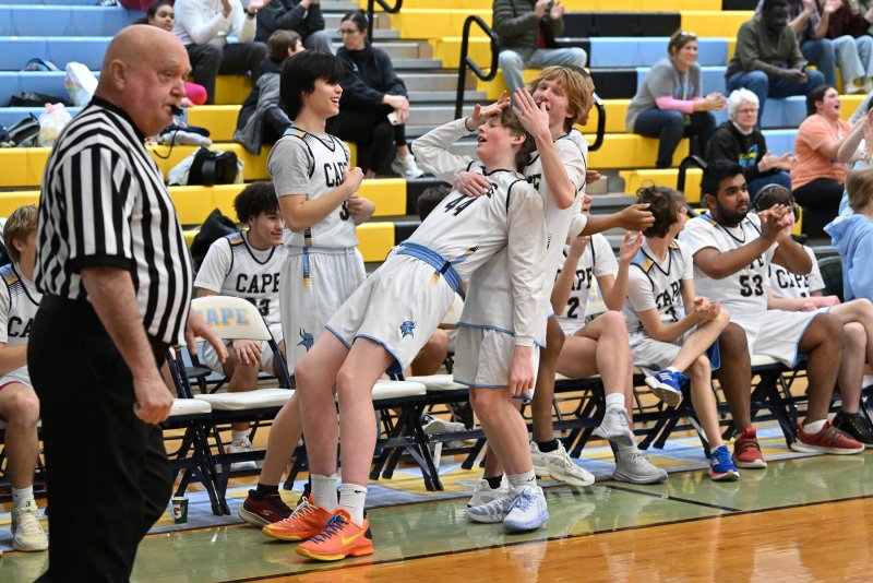 Cape’s Erichson McMahon celebrates a good play with teammate Bennett Steinmann.