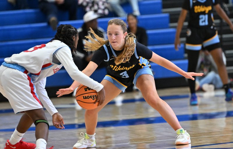 Cape’s Mairead Rishko plays defense on Early College’s Ava Brickhouse-Reid.