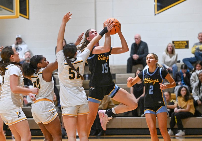 Cape senior Amalia Fruchtman glides in strong for a deuce.