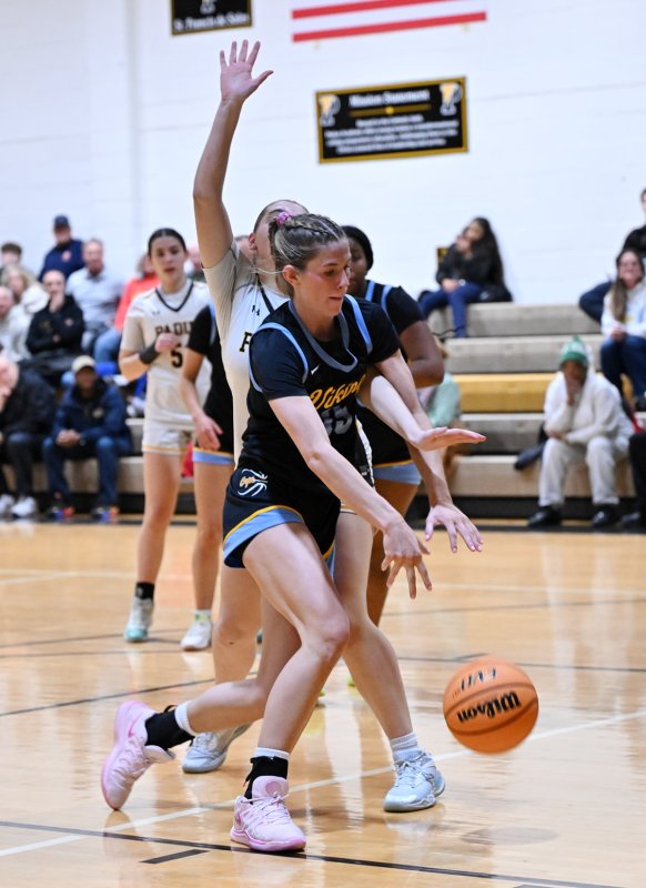 Senior Amalia Fruchtman drives past Padua’s Lilianna DiMarco.