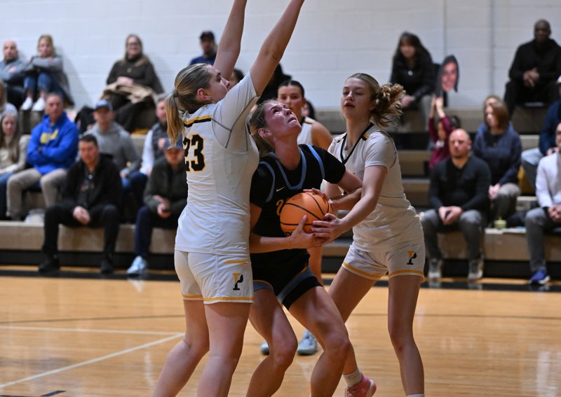 Amalia Fruchtman gets fouled underneath.