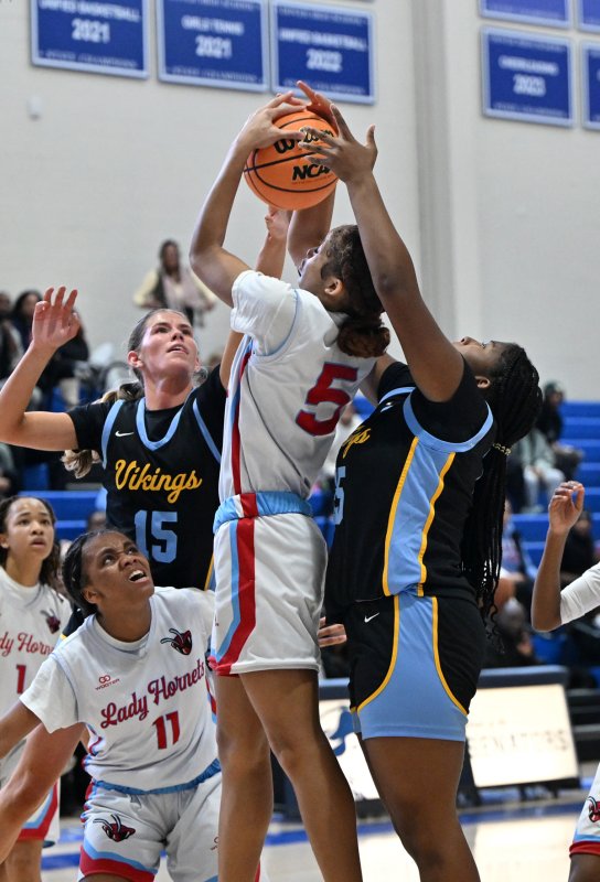 Cape sophomore Jordynn Bowe grabs possession from Early College’s Jayla Dukes.
