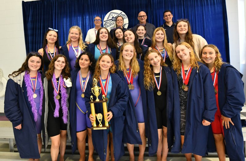 The Sussex Academy girls won the Henlopen Conference Championship meet Feb. 7. Shown in back are (l-r) coaches Guy Gosselin, Stephanie Hartsoe, Tom Martiner and Nico Caceres. In middle are Claudia Warren, Emily Obertubbesing, Gretchen Maughan, Paige Blaine, Lily Bradley, Morgan Kleintop, Catherine Elder and Kendall Rhodes. In front are Madeline Perchiniak, Sarah Lester-Stranick, Camila Figueroa, Victoria Evans, Anna Mumford, Eliza Evans, Sam Petty and Caitlin Perchiniak.