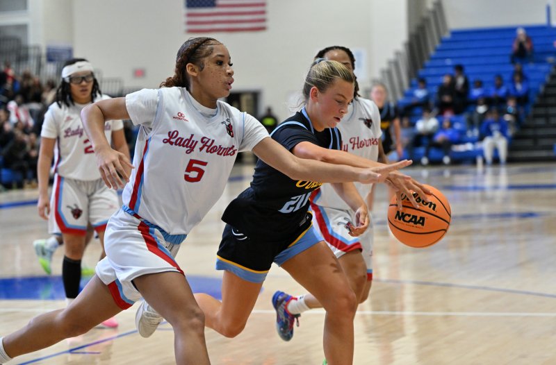 Cape junior Ally Diehl snags a steal from Early College’s Jayla Dukes.