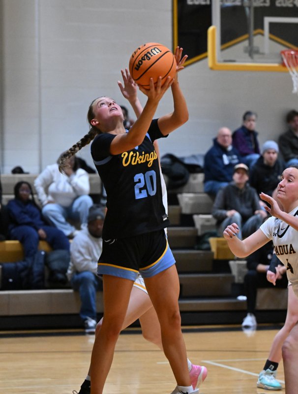 Junior Ally Diehl hits from underneath.