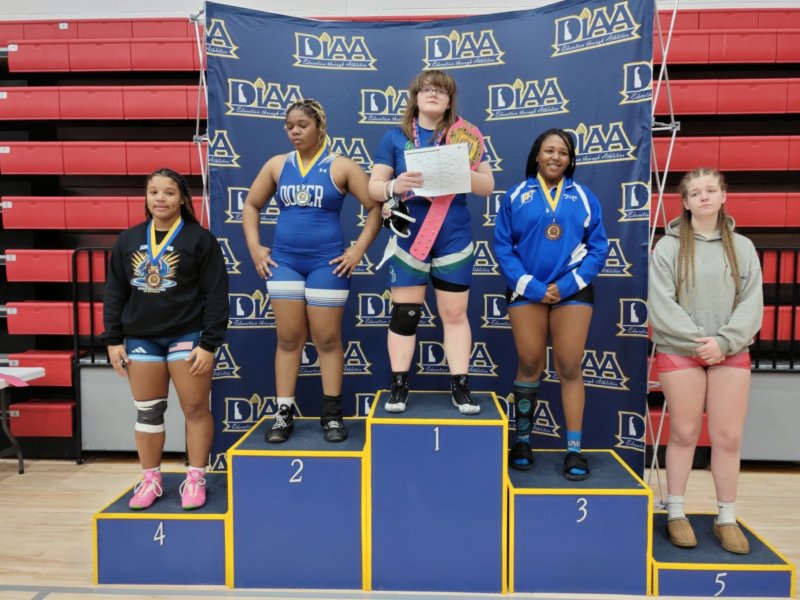 Shown on the 185-pound podium are (l-r) Kiersten Smith (Cape), Layla Jones (Dover), Ava Ulrich (St. Georges), Siani Fontaine (Charter School of Wilmington) and Addison Affeldt (Smyrna).