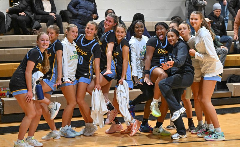 The Cape girls’ basketball team celebrates its 39-28 win over Padua Academy Feb. 5 in Wilmington. DAN COOK PHOTOS