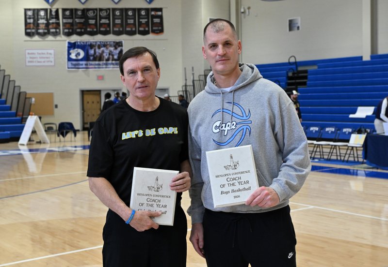 Earning Coach of the Year honors for the Henlopen Conference are Ron Dukes for the girls and Steve Re for the boys.