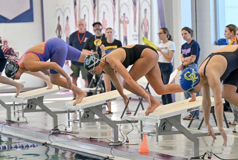 Cape sophomore Mia Thompson leaves the blocks in the 50 freestyle. She finished with a time of 28.90.