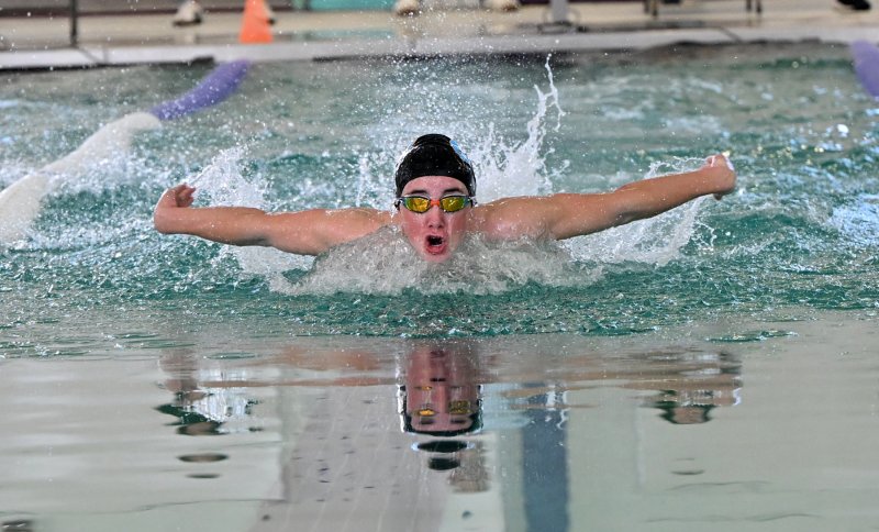 Cape junior Hugh Jack swims the 100 butterfly in a time of 1:04.54.