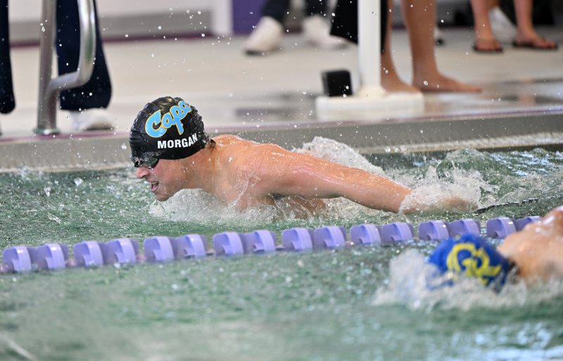 Cape senior Ryan Morgan swims the 100 butterfly in 1:00.79.