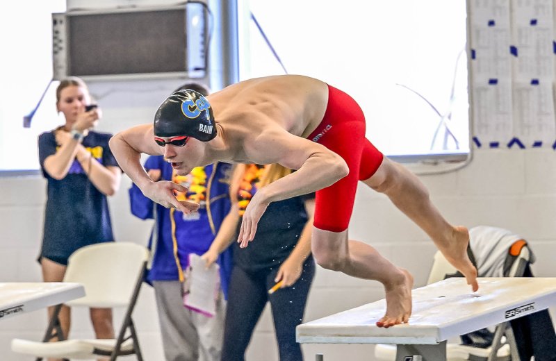Cape sophomore Jack Bain leaves the blocks in the 500, which he won with a time of 5:00.91.