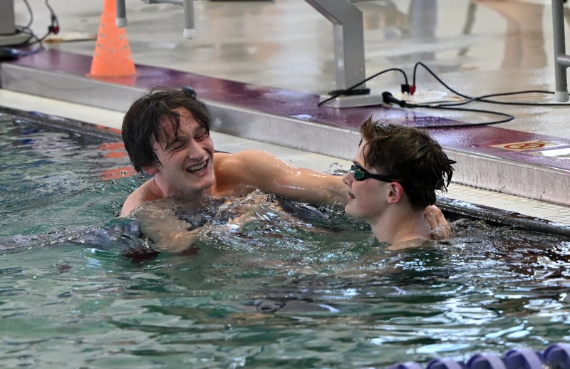 Cape’s Jack Bain and Brandt Kuklish celebrate their 1-3 finish in the 500. Cape junior Cole Huxtable placed second for the sweep.
