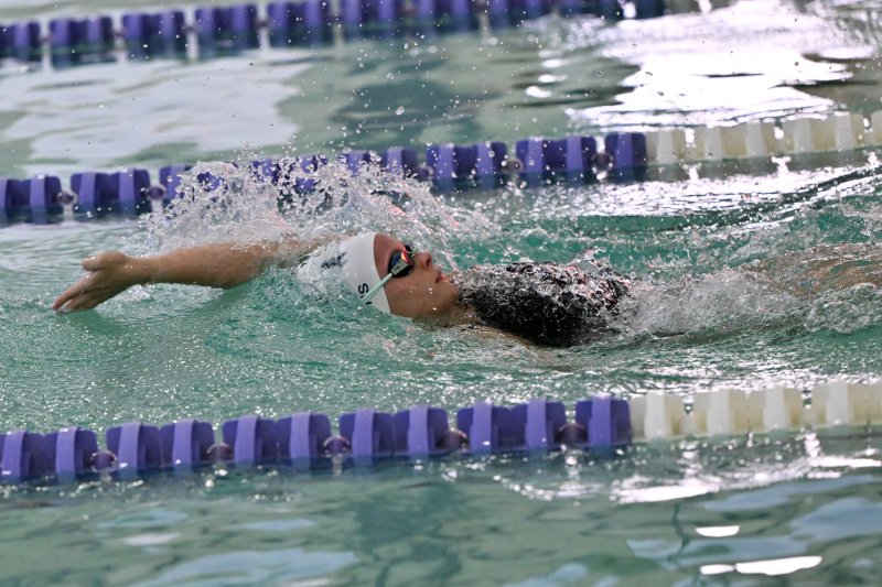 Sussex Academy senior Victoria Evans wins the 100 back with a time of 1:03.08.