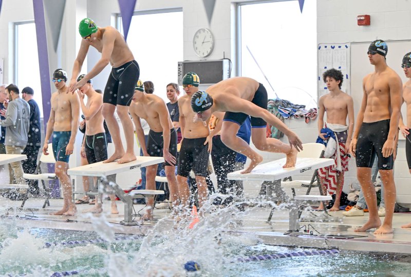 Cape junior Elijah Oliver leaves the blocks in the 400 free relay. He teamed with Jack Bain, Brady Schell and Jaxen Edwards to win the event in a time of 3:16.62.