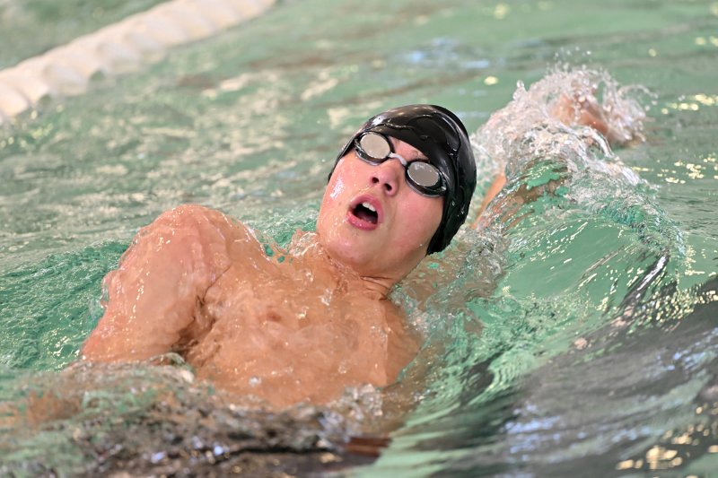 Cape freshman Liam Passo swims the 100 back to a time of 1:08.02.