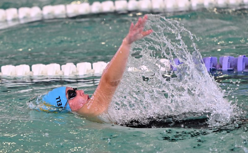 Cape freshman Sara Caldwell swims to a 1:18.32 time in the 100 backstroke.