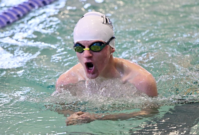 Tech junior Drake O'Neill swim to a time of 1:22.82 in the 100 breaststroke.
