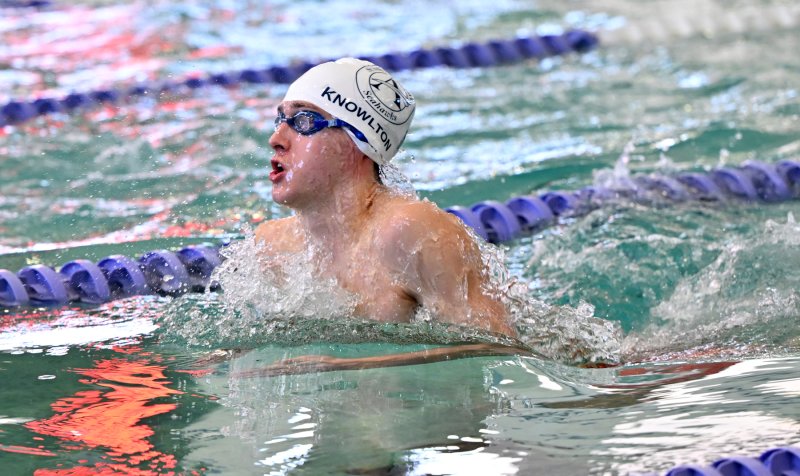Sussex Academy freshman Reed Knowlton places third int he breaststroke in a time of 1:07.33.