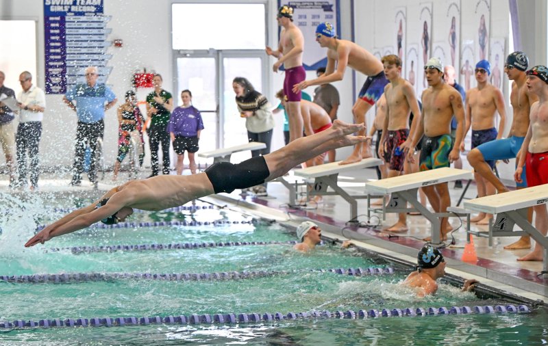 Cape junior Brady Schell leaves the blocks in the 400 free relay. He along with Jack Bain, Eli Oliver and Jaxen Edwards won with a time of 3:16.62.