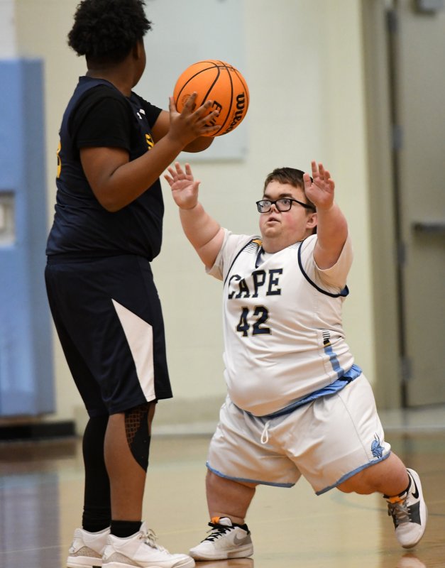 Cape sophomore Norman Rust plays close defense on a Seaford forward.