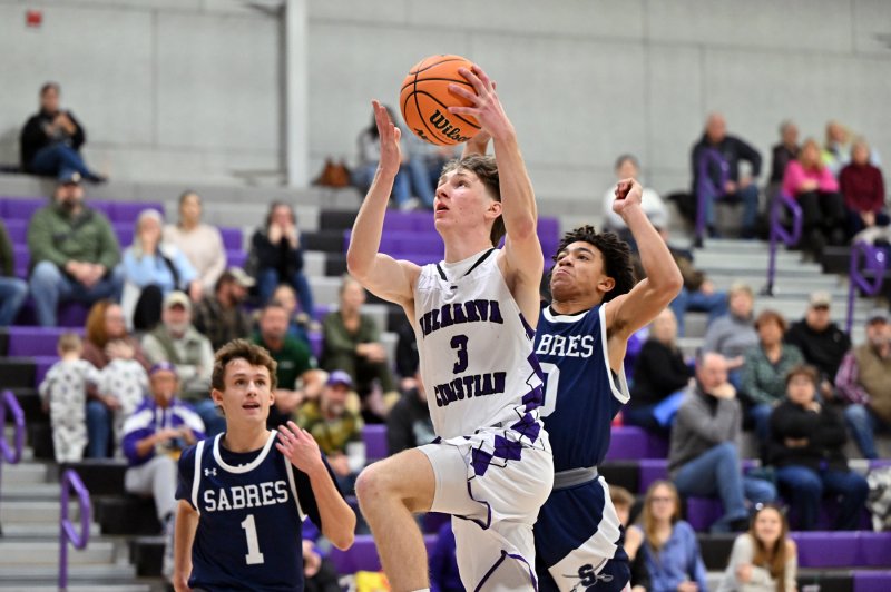 Royals junior forward Noah Barbrow goes up strong in the paint.
