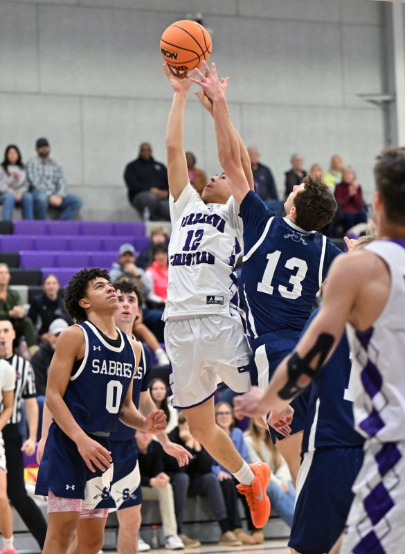 Royals freshman Aarian Tucker takes a shot in the paint.