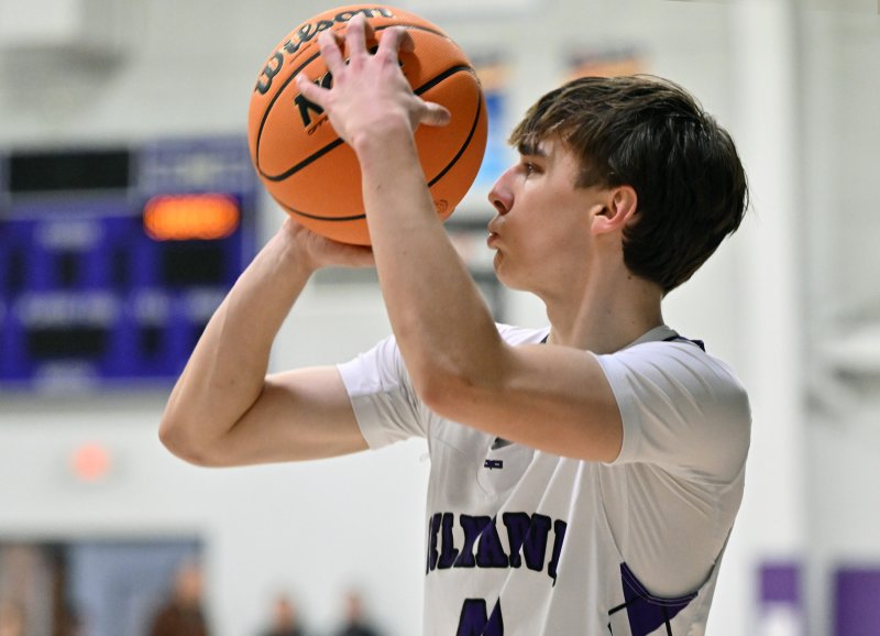 Royals sophomore Asher Woods hits a three.