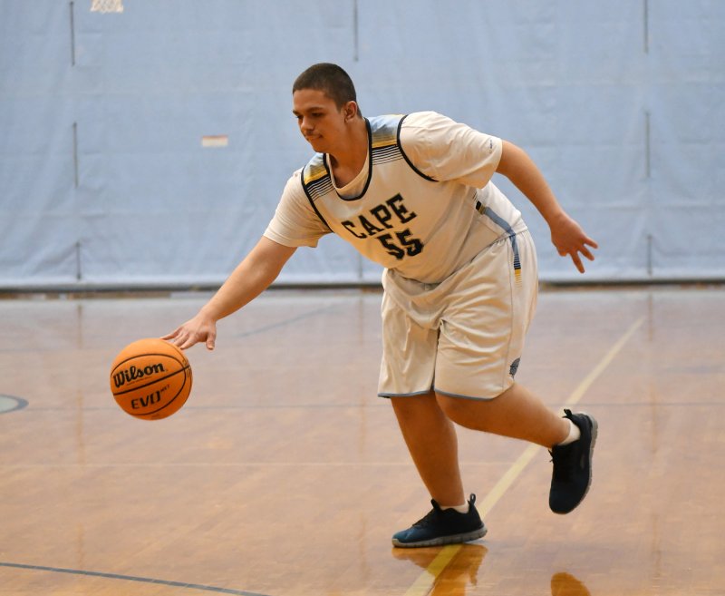 Junior Austin Hastings drives to the paint.
