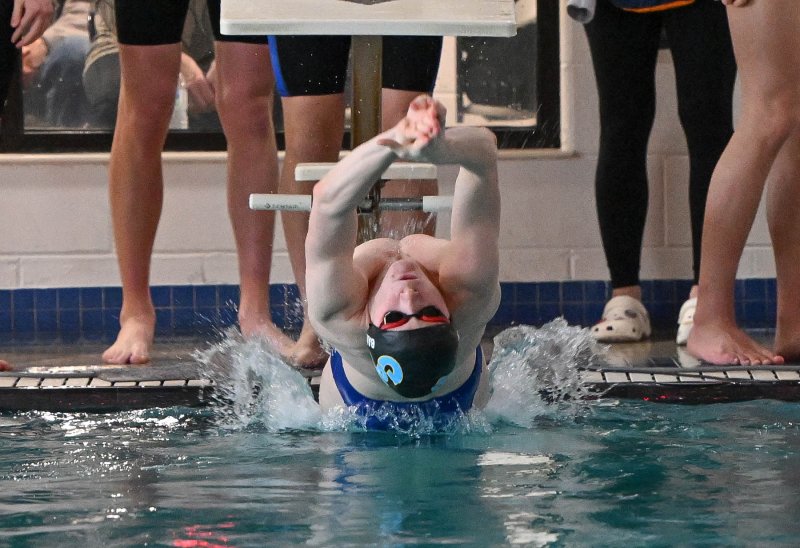 Cape’s Jack Bain leaves the blocks in the 200 medley relay.