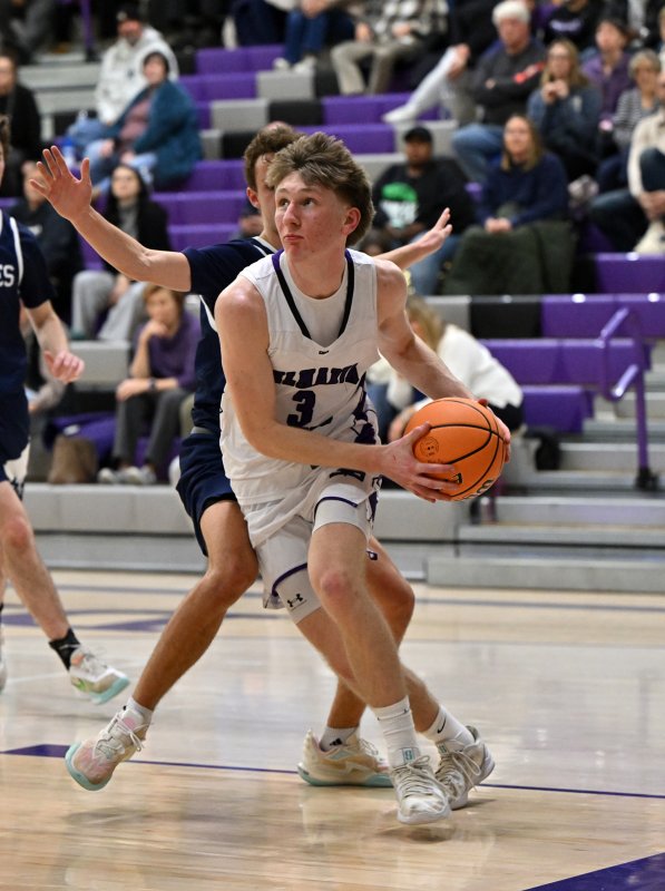 Royals junior Barbrow drives baseline. He scored eight points in the contest.