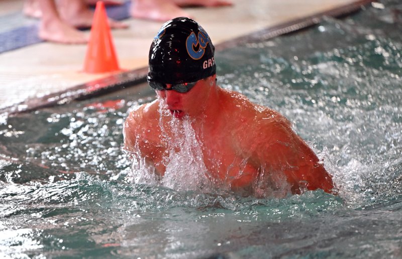 Cape senior Kyle Green swims the breaststroke leg of the medley relay.