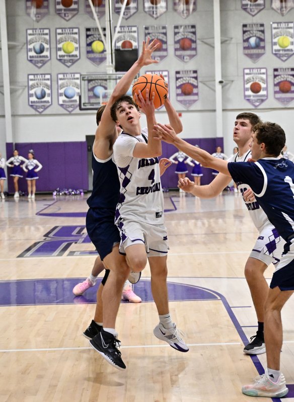 Royals guard Asher Woods hits two of his game-high 12 points down the stretch.