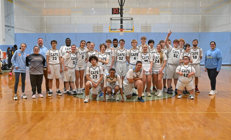 The Cape unified basketball team shows their smiles after the game with the Seaford Blue Jays. DAN COOK PHOTOS
