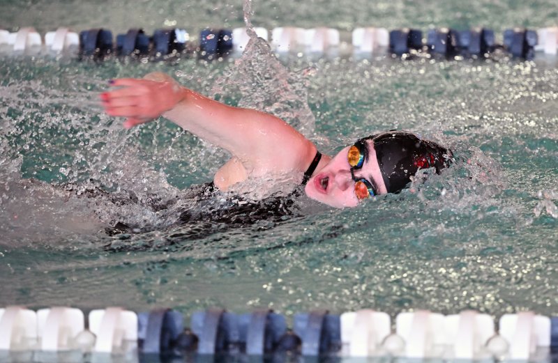 Senior Gianna Razze swims the 50 free.